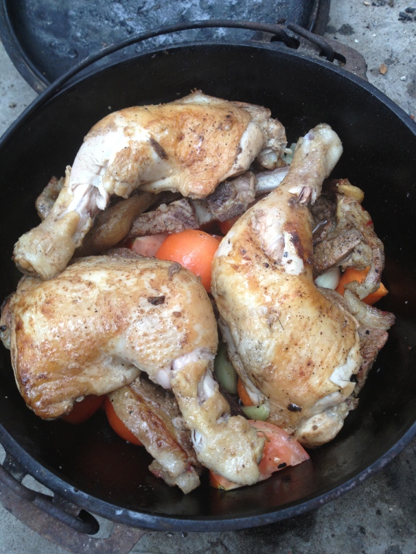 chicken and lamb with tomato, onion, carrot and anchovies
