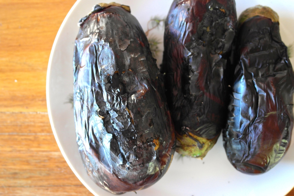 Grill the eggplant over an open flame so it gets all black and delicious looking